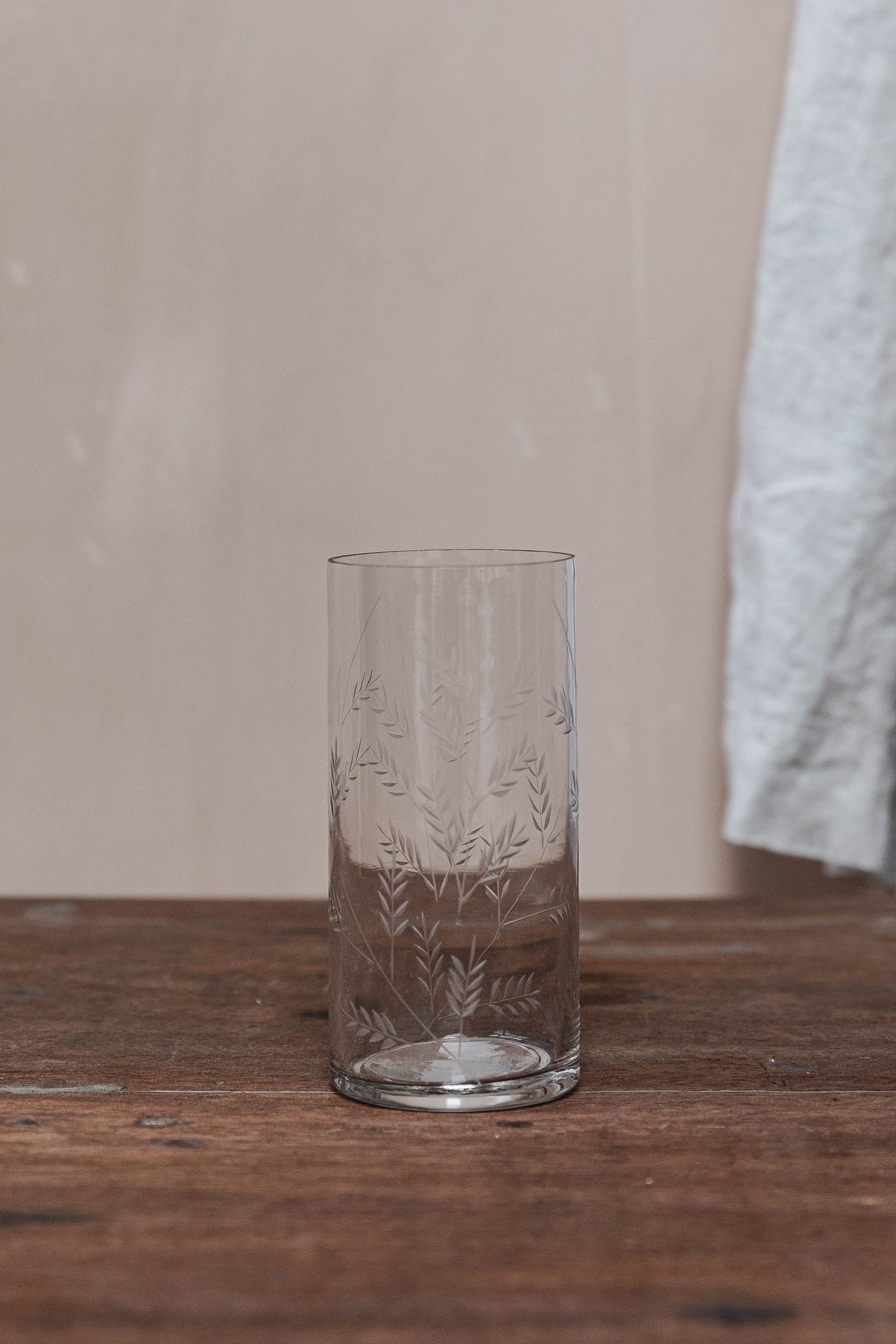 Slim handblown etched glass vase