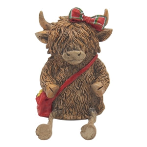 Highland cow figures with dangly legs