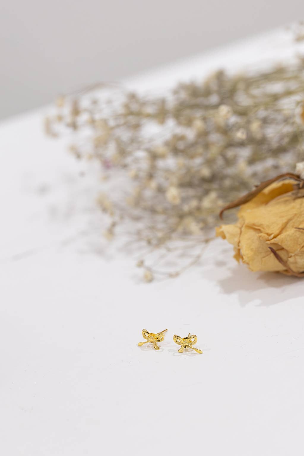 White Leaf - Little Bow Earring in Gold Plated Sterling Silver