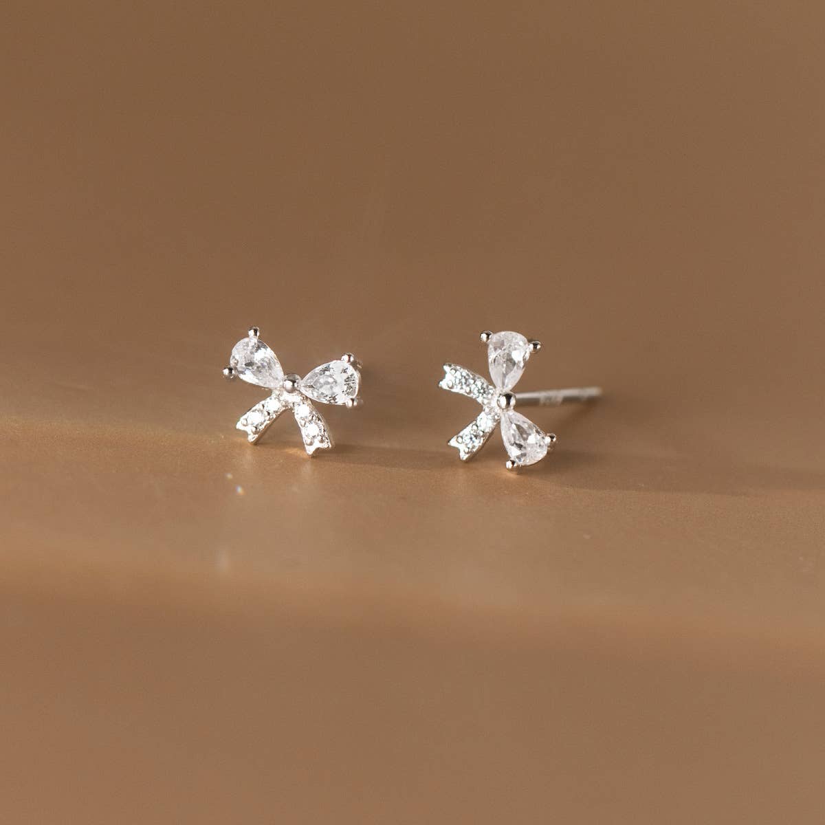 White Leaf - Cubic Zirconia Bow Earring in Sterling Silver