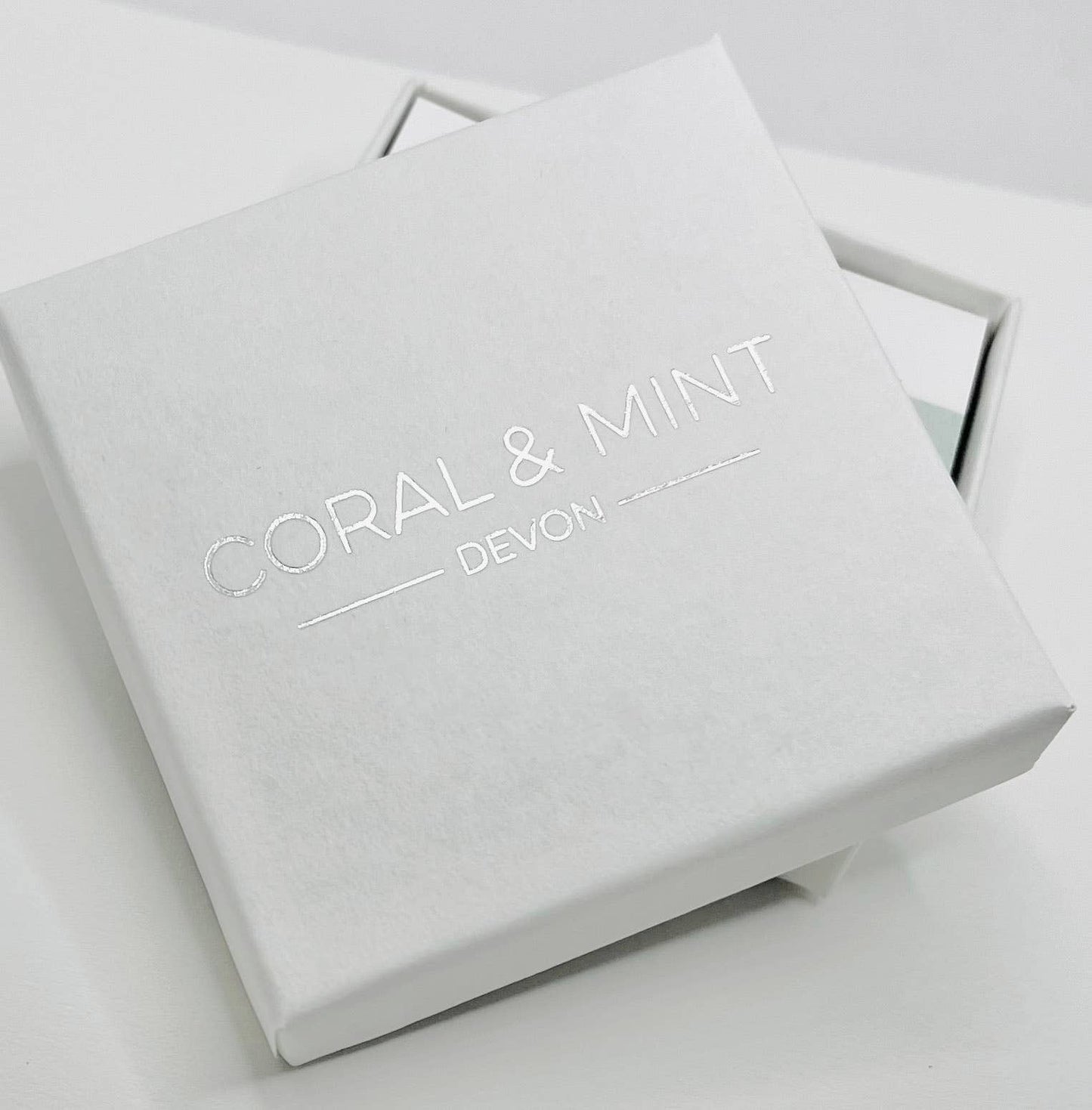 Coral and Mint - Black Star Studs