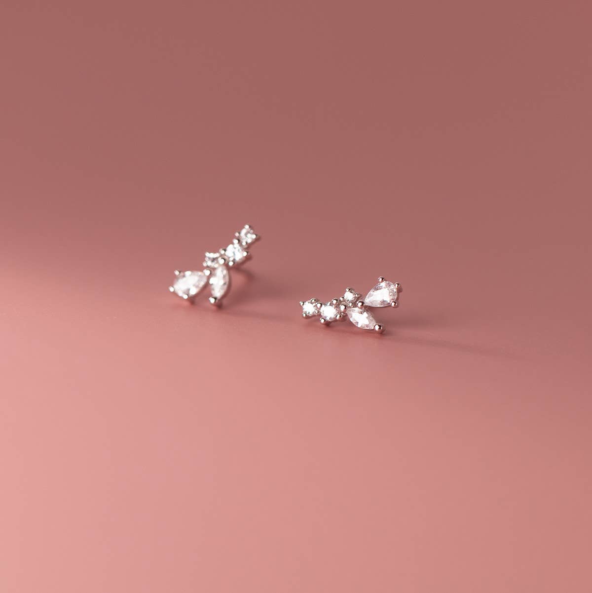 White Leaf - Tiny Curved Cubic Zirconia Earring in Sterling Silver