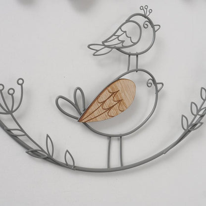 Wire and wood circular wreath with bird motif. 2 slogans home and love
