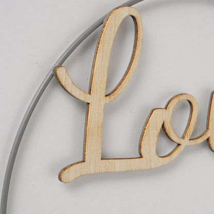 Wire and wood circular wreath with bird motif. 2 slogans home and love