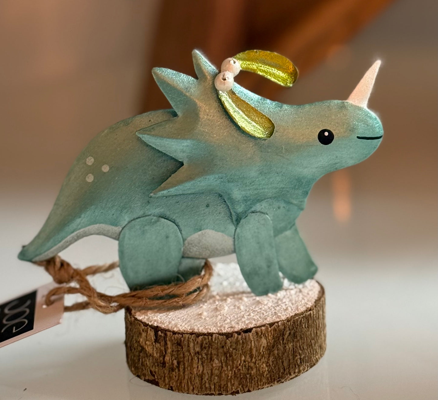 Christmas triceratops on stand by Shoeless Joe