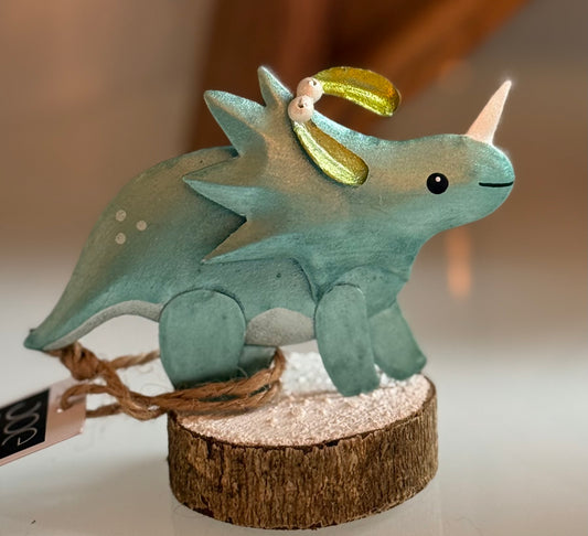 Christmas triceratops on stand by Shoeless Joe