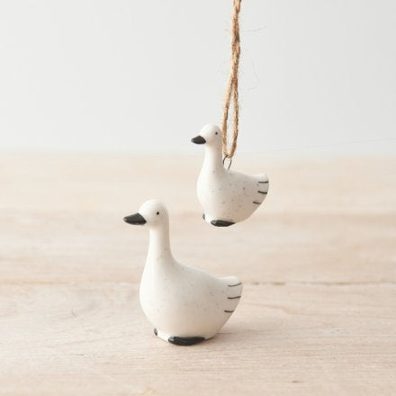 Porcelain black and white animals handing and standing