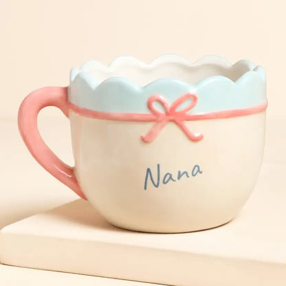 Cream Ceramic Scallop Edge Bow Nana Mug