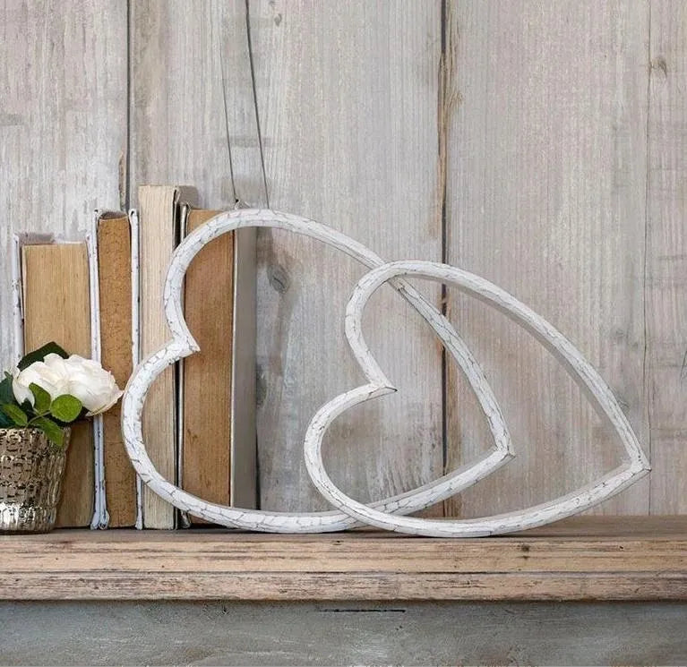 set of two wooden white sleeping hearts