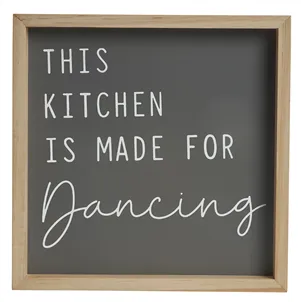 “This kitchen is made for dancing” sign