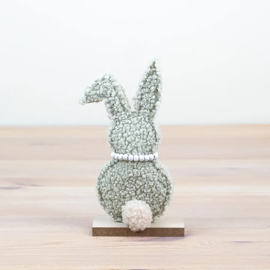 Sherpa natural or green colour Rabbit On Wooden Base, 17cm