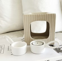 White ceramic tea light sliders