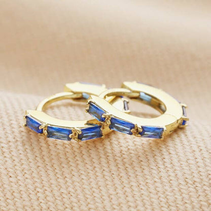 Lisa Angel - Blue Baguette Crystal Huggie Hoop Earrings in Gold